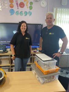 Two of the MSDS Marine team during a school visit stood in the classroom